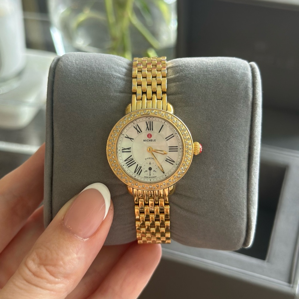 Michele Gold Timepiece with Classic White Face